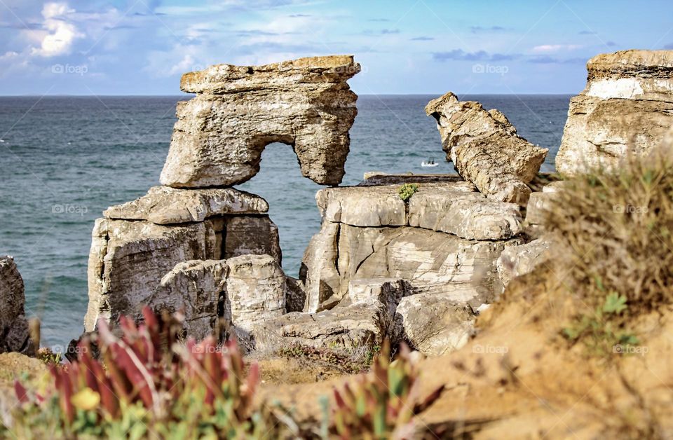 The Jurassic coastline, weathered & eroded into interesting shapes at Peniche, Central Portugal 