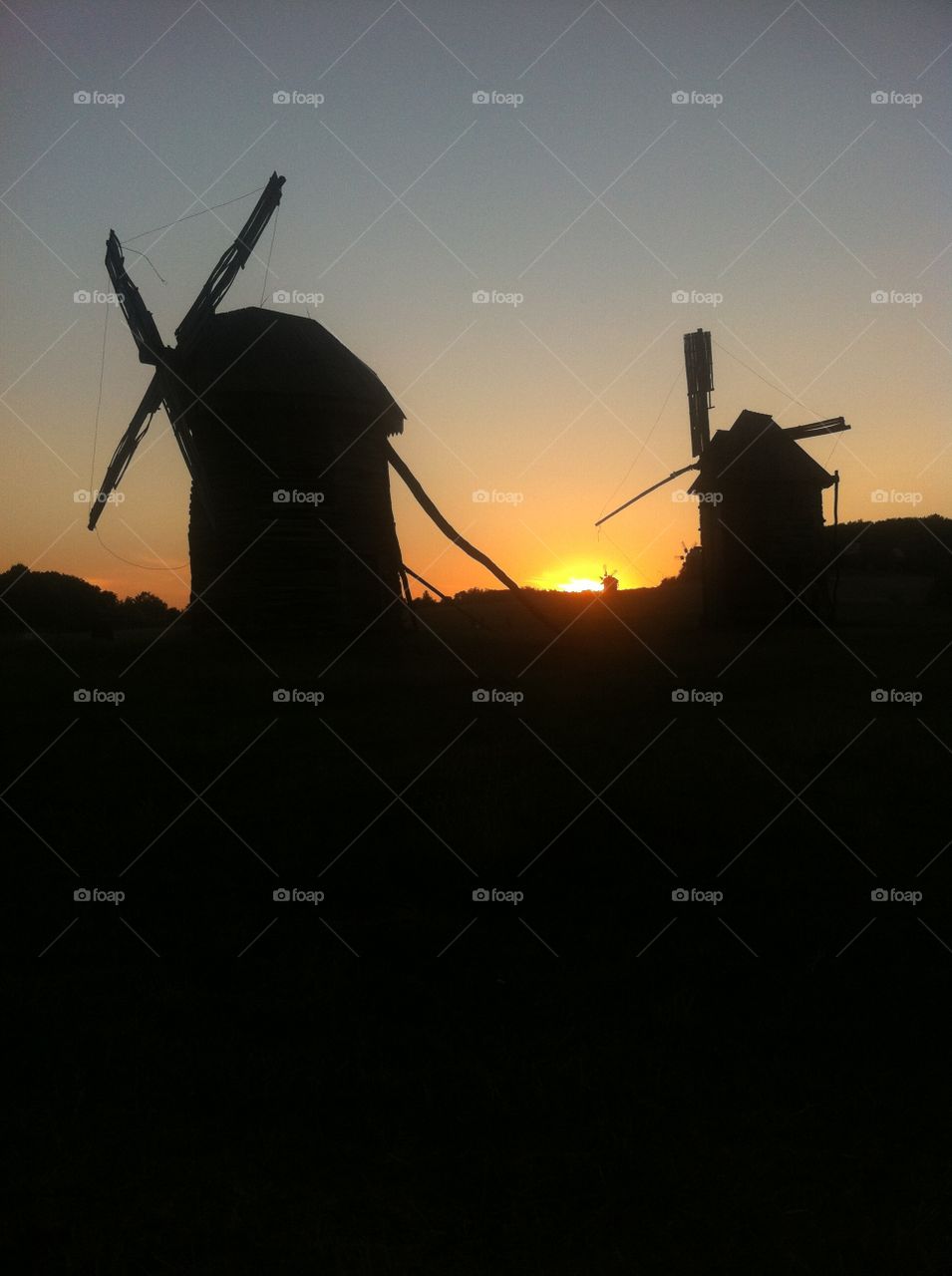 Windmills on background . Windmills 