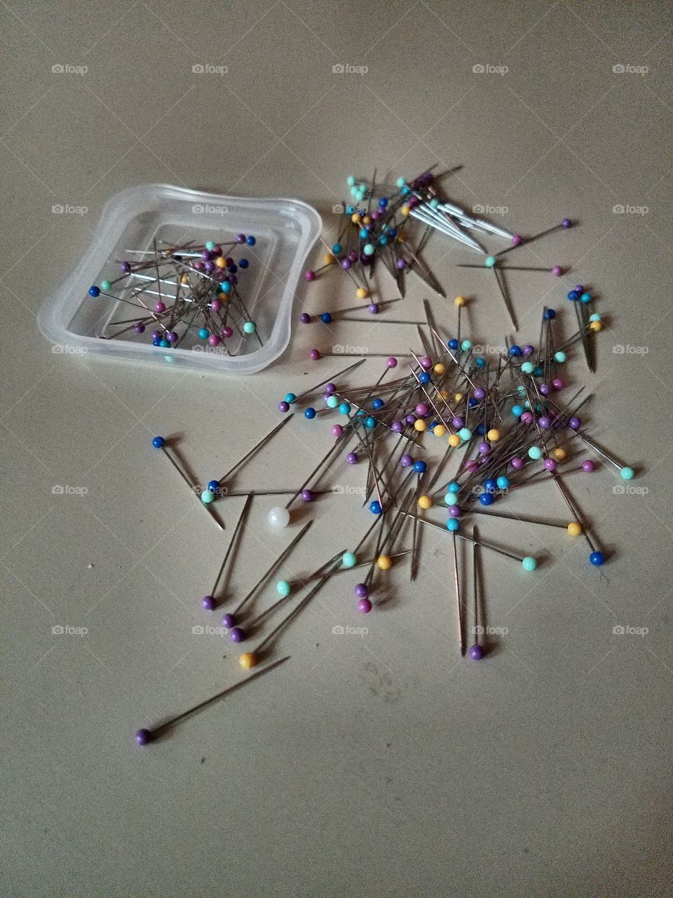 Common Pins loose on table.