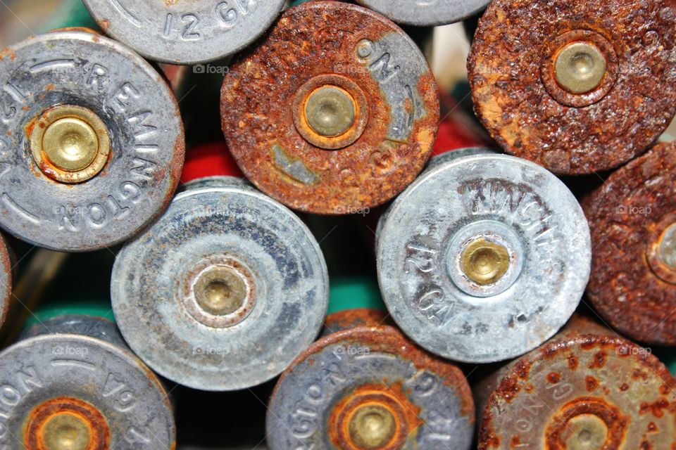 Rusted shotgun shell casings