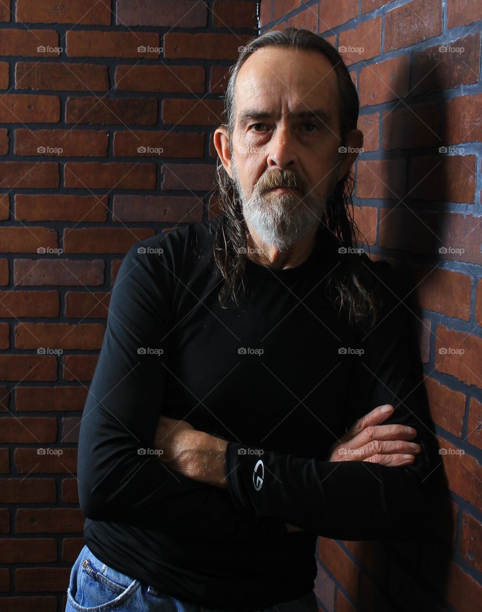 standing in the shadows