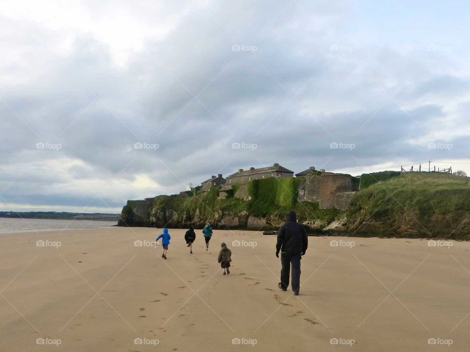 racing down the beach