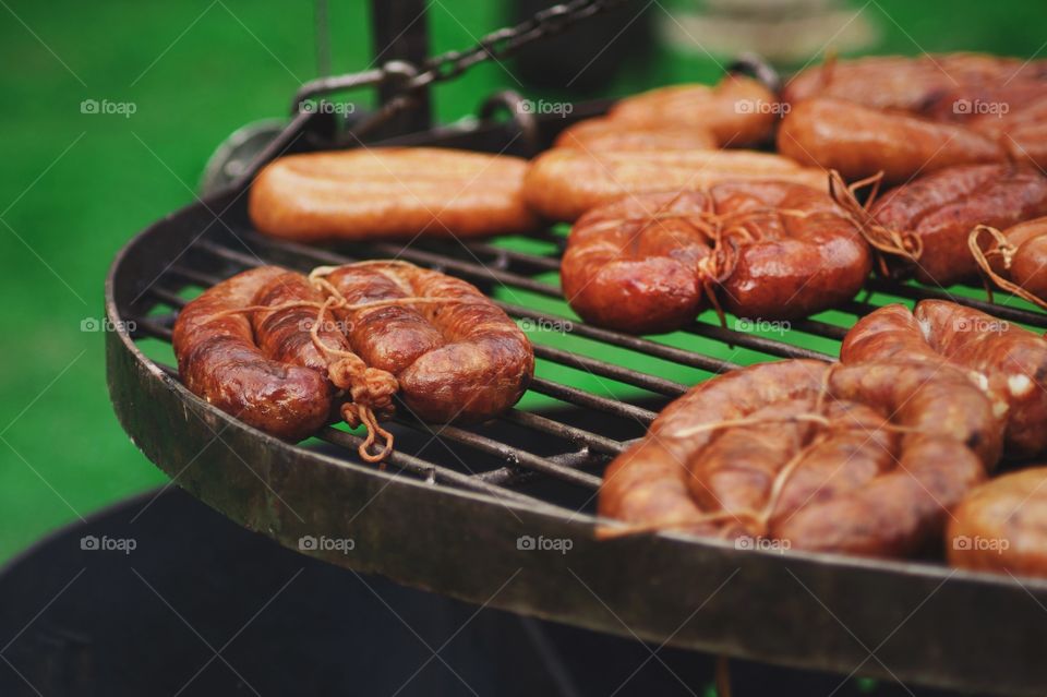 Preparation of meat on barbecue grill