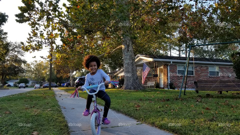 child riding bicycle.