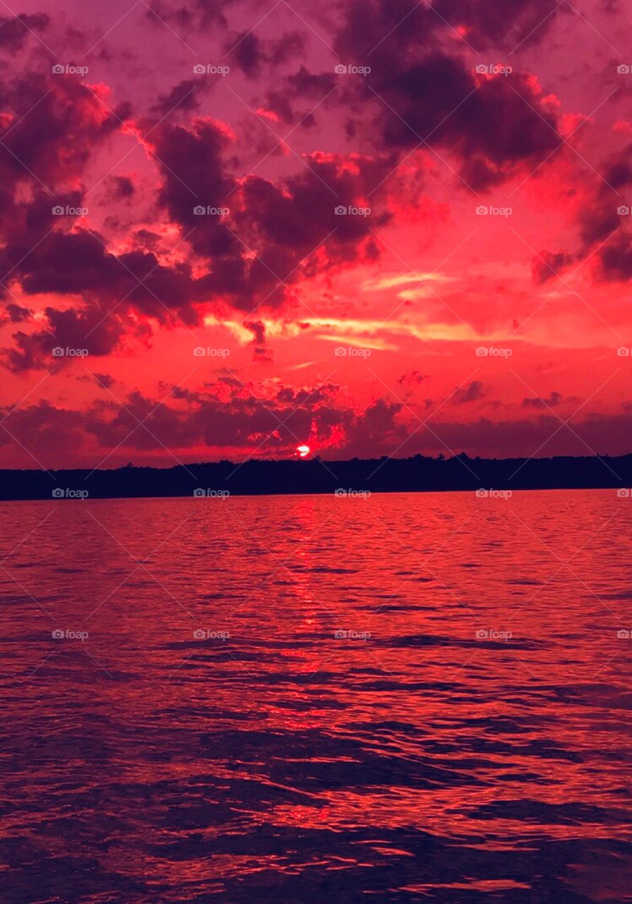 Pink sunset over Hamlin Lake—taken in Ludington, Michigan 