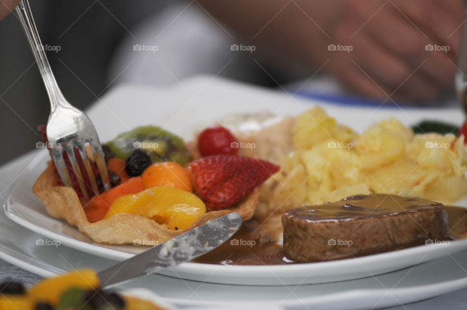 fruit dessert with fork covered