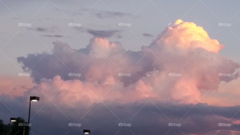 Clouds lit by sunset