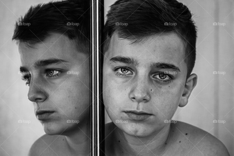 Portrait of boy in black and white colors