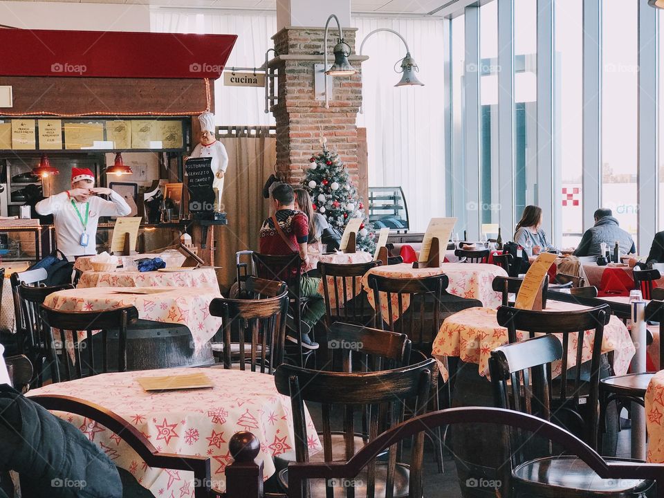 Waiting for the flight at the Italian restaurant at the airport