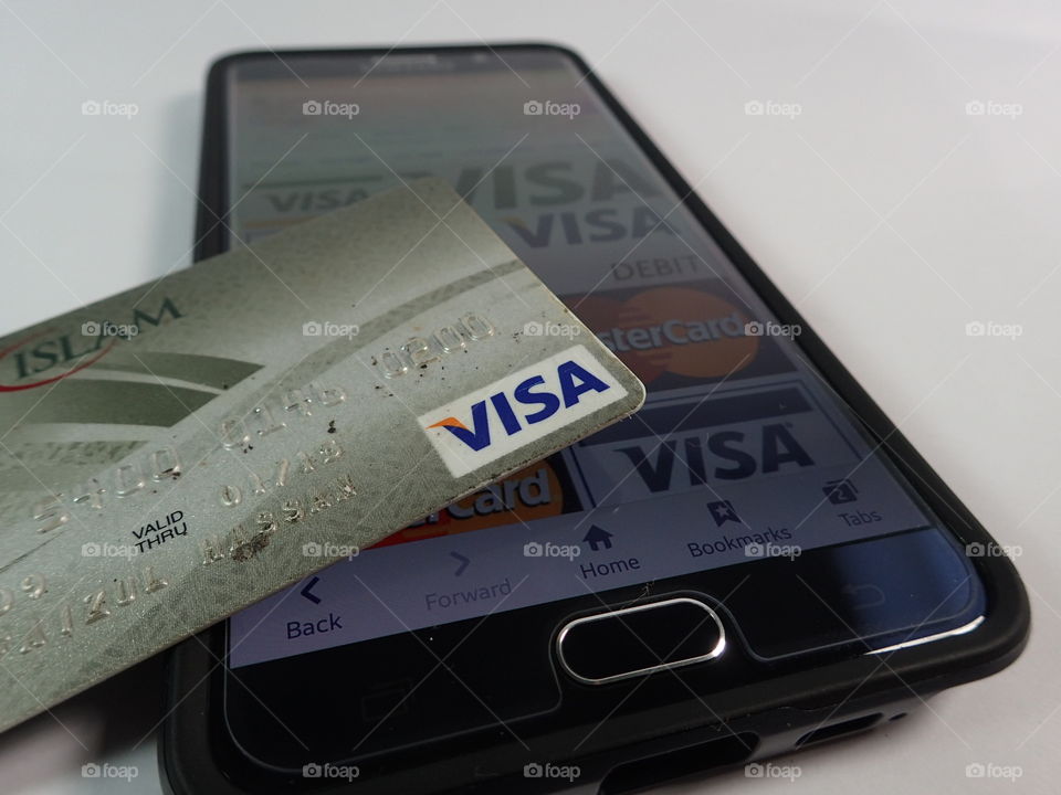 visa credit card with smartphone