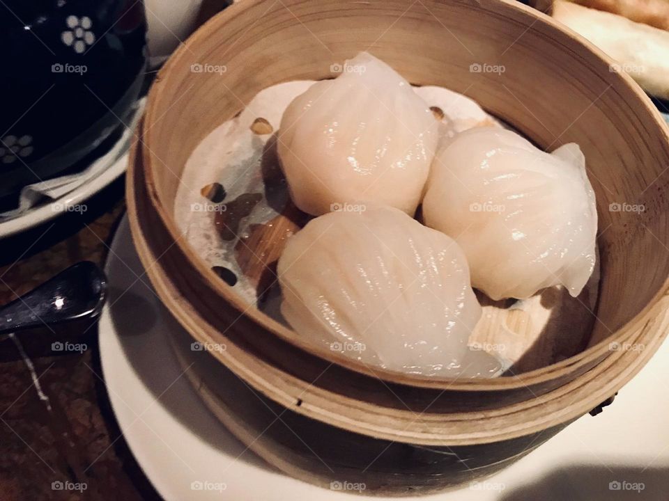 Chinese dim sum dinner dumplings inside bamboo steamer basket, Asian cuisine, Cantonese cuisine, Chinese cuisine 