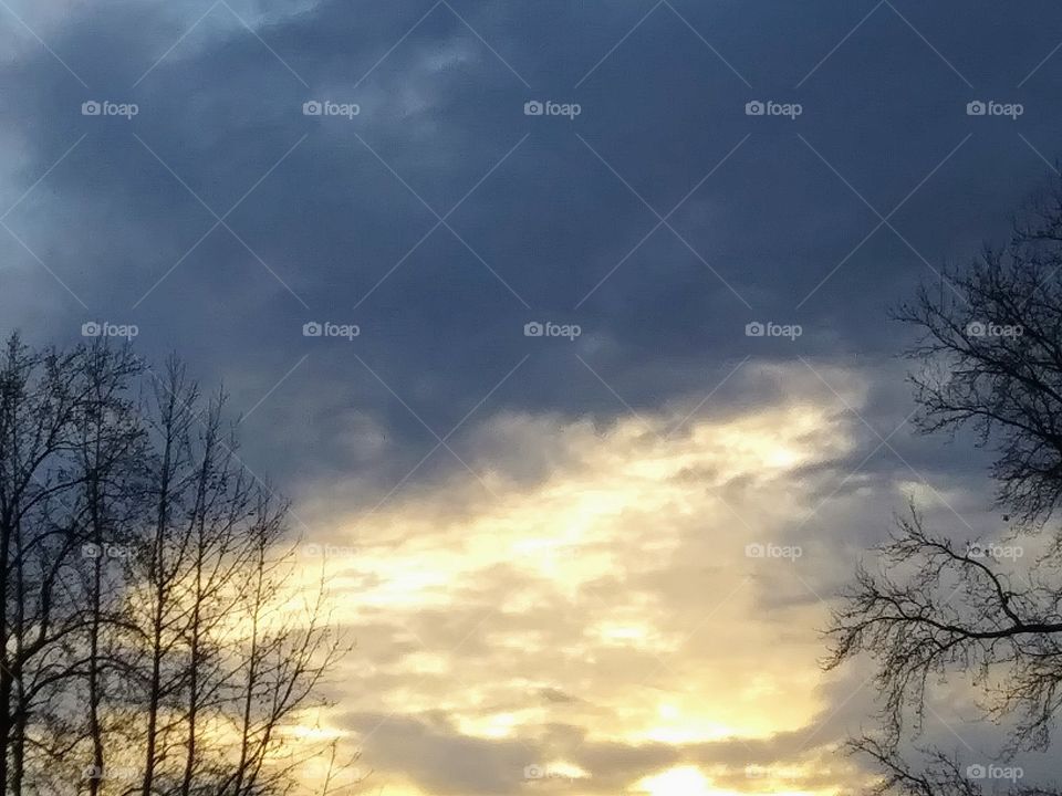 glow of sunset on evening clouds