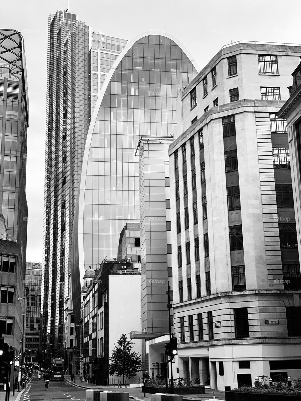 Oval-shaped crystal skyscraper stands out against London sky in the Aldgate district