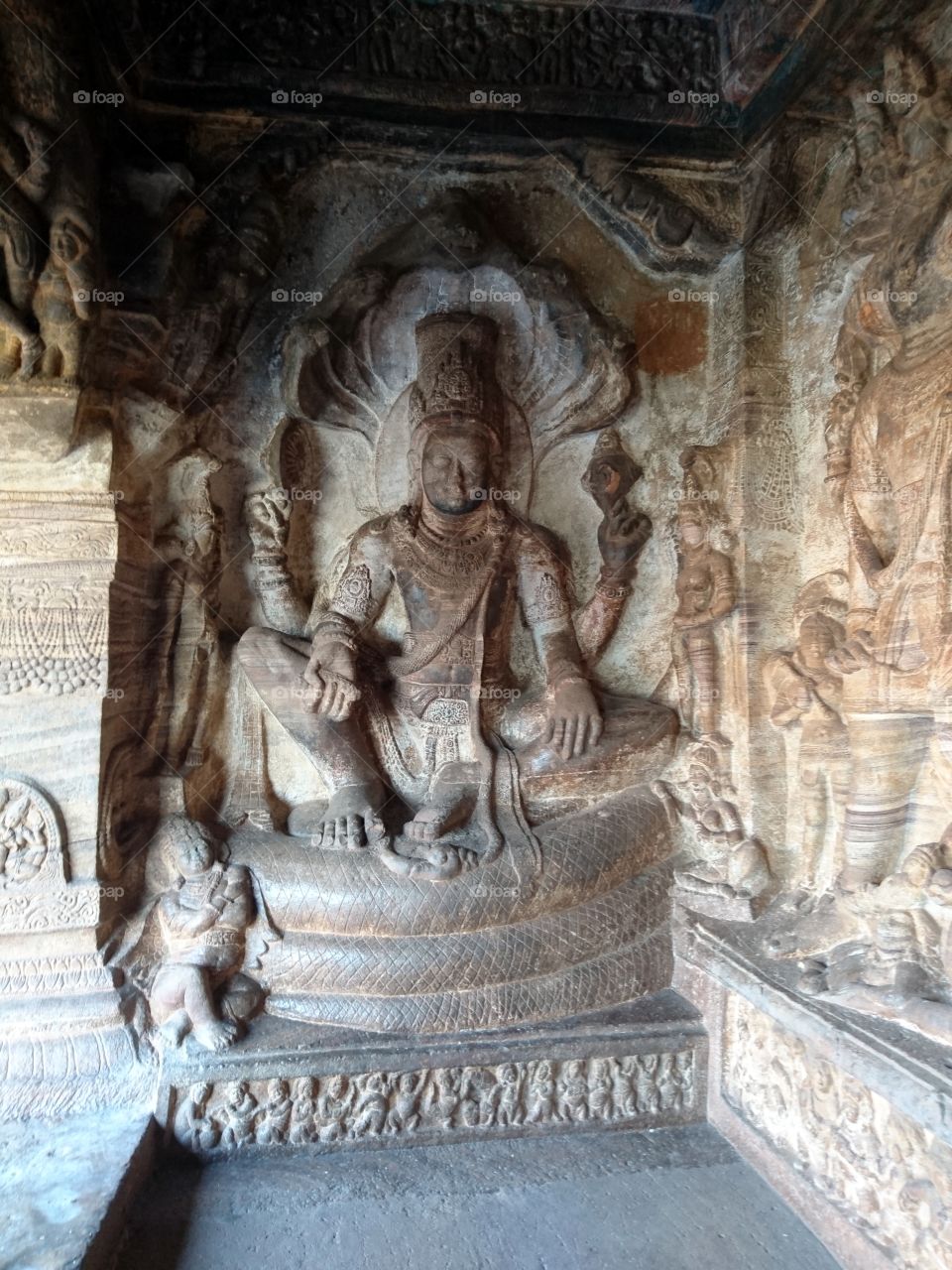 Badami cave complex - sculptures represents lord vishnu sitting on a serpent (snake, Sesha) belong to 6th century