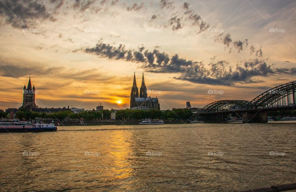 the Cathedral,the Rhine River and the Cityscape of Cologne NRW Germany Europe during the Sunset Timeline
