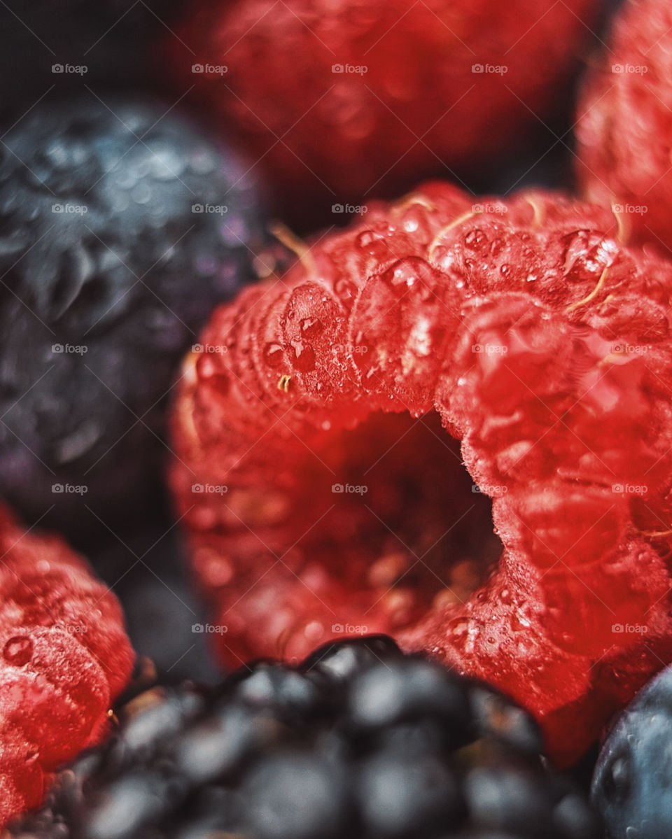 Macro shot of raspberry and blueberry