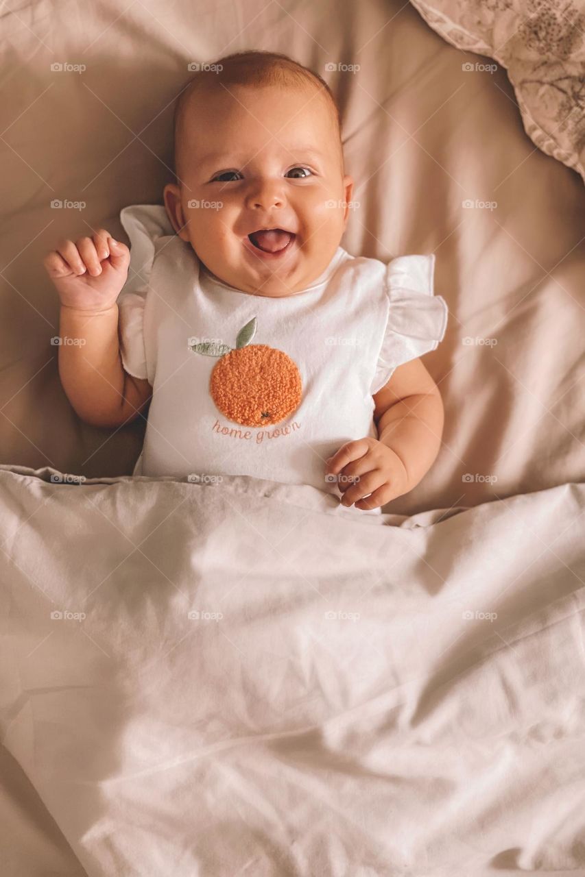 Portrait of a smiling baby girl