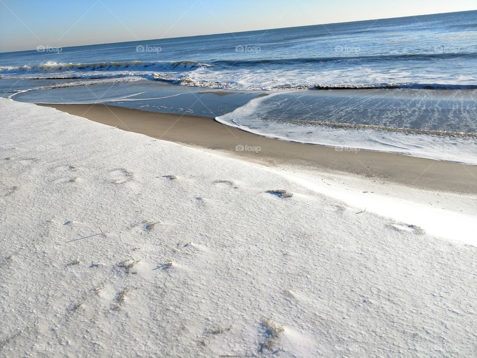 Snow on the beach in North
