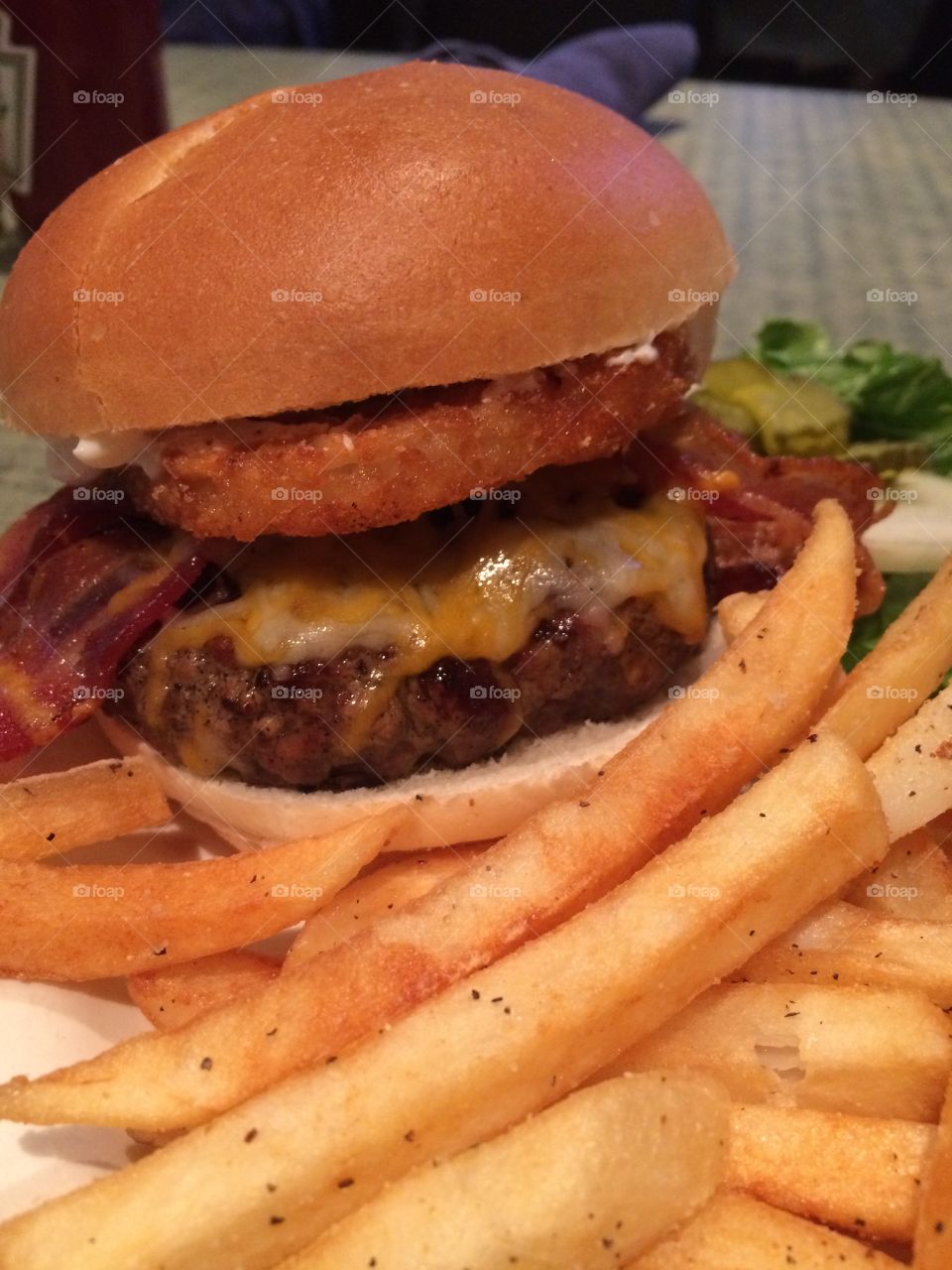 Hamburger and Fries. Hamburger and fries on a plate.