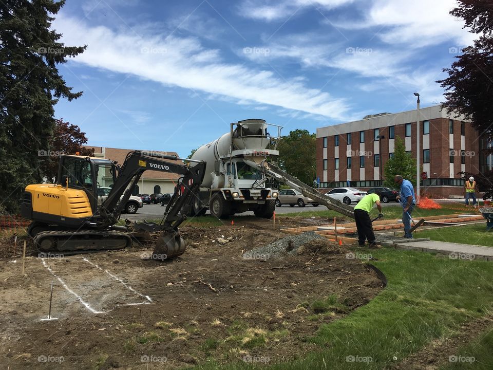 Construction workers and cement truck 