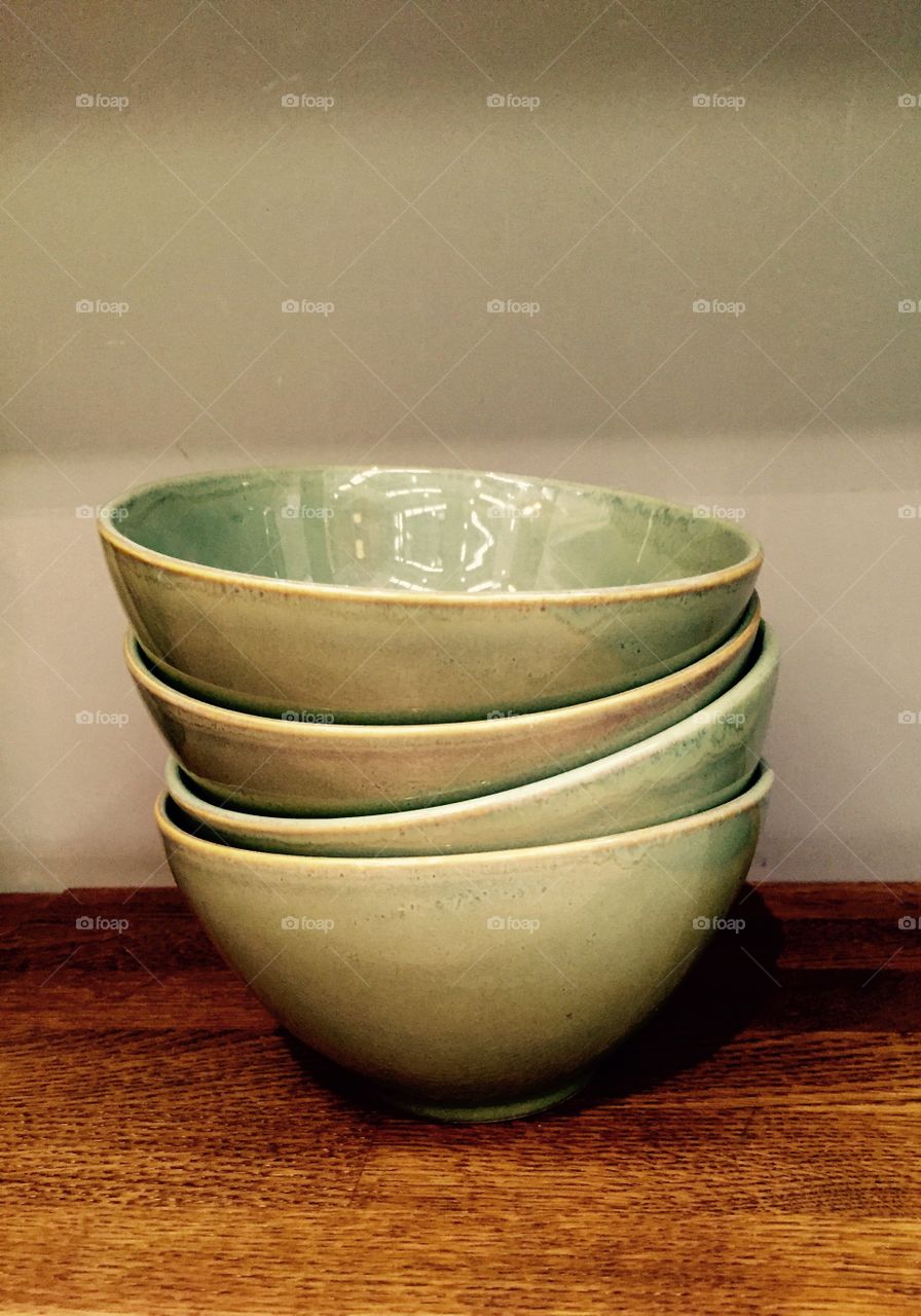 Bowls stacked up on the kitchen work top