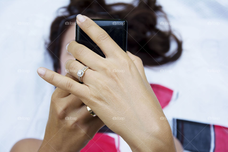 woman using phone. woman hands using phone closeup