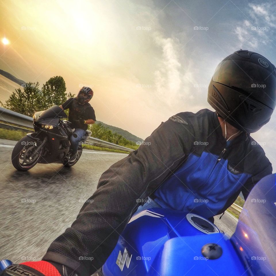 Motorcycle sunset cruise across Lake Monroe, Bloomington. 