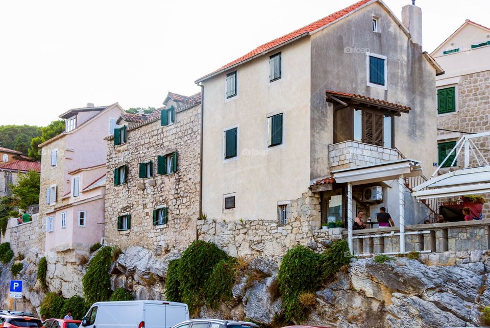 Homes built on the cliffs above the sea surface but today there's a road