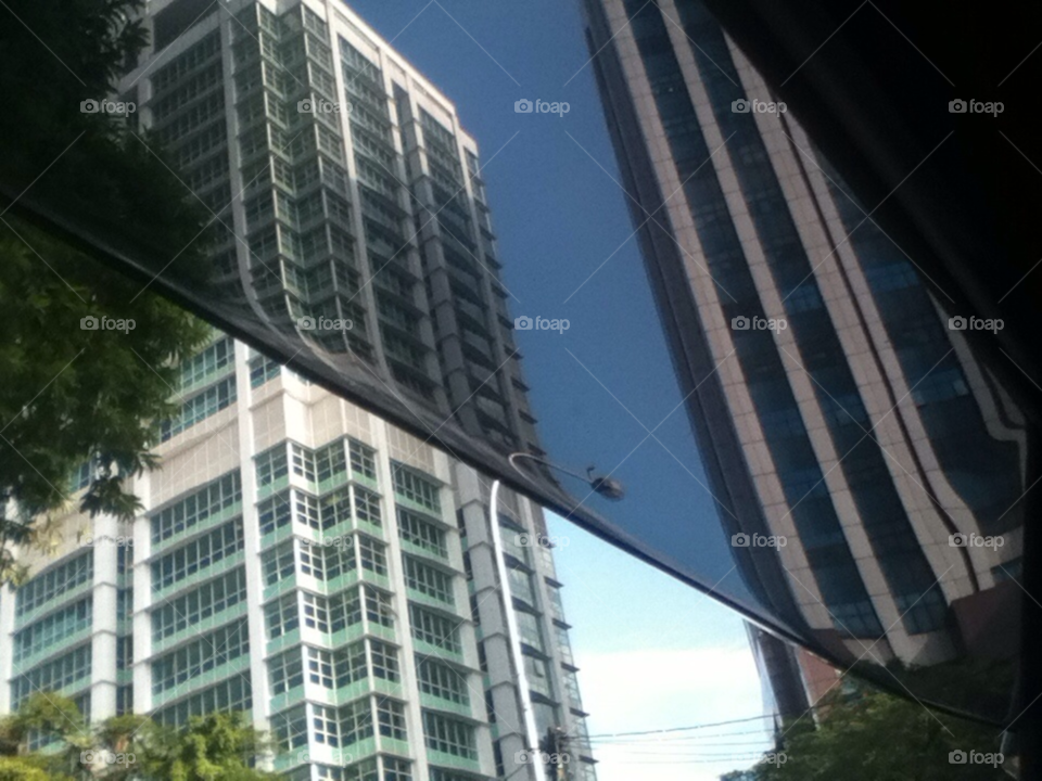lamppost buildings reflection malaysia by Click