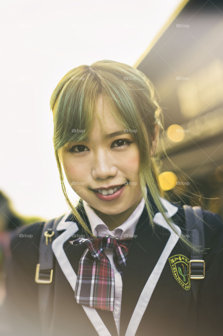 Close up portrait of Japanese school girl cosplay in the street of Kyoto