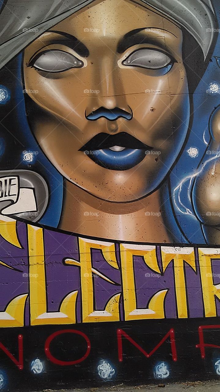 Shaded eyes. Driving through the alley