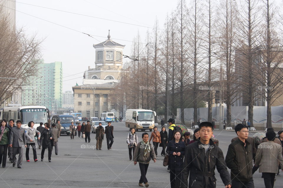 Pyongyang North Korea street scene commuters