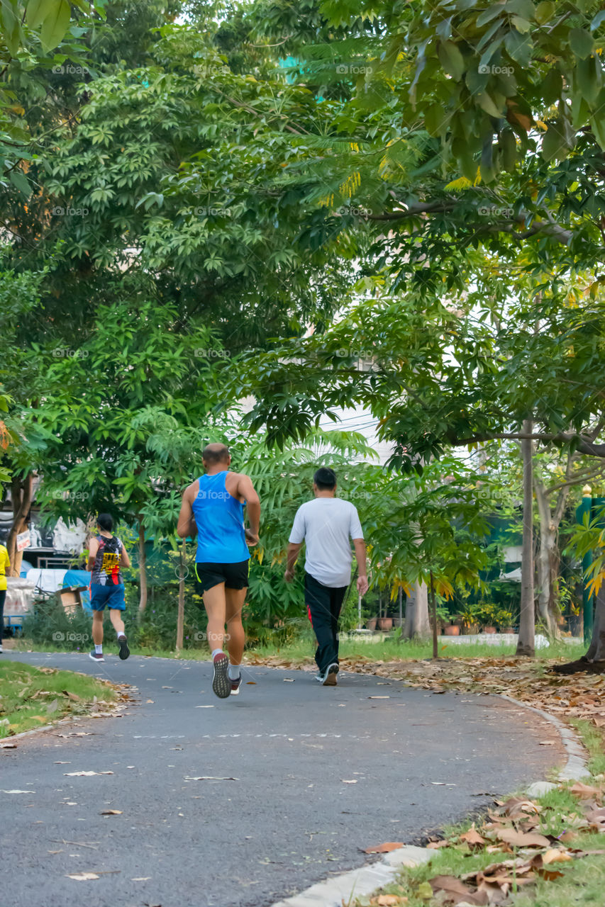 The people running exercise for health in the BangYai park , Nonthaburi in Thailand. December 3, 2018