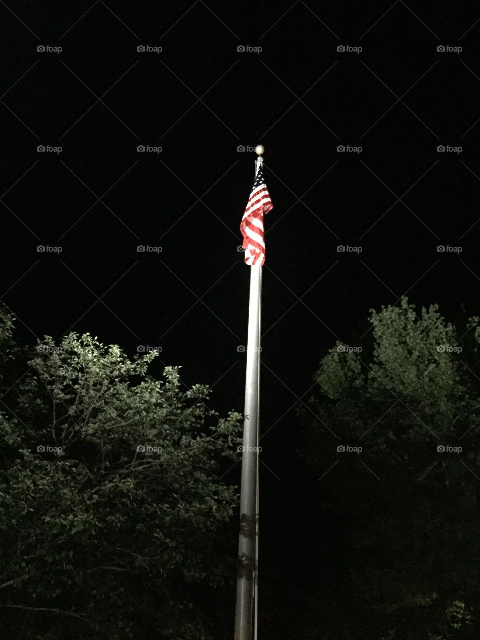 Lit flag at night