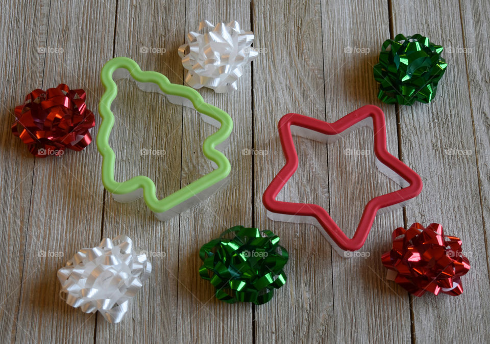 Christmas themed decorations on wood background