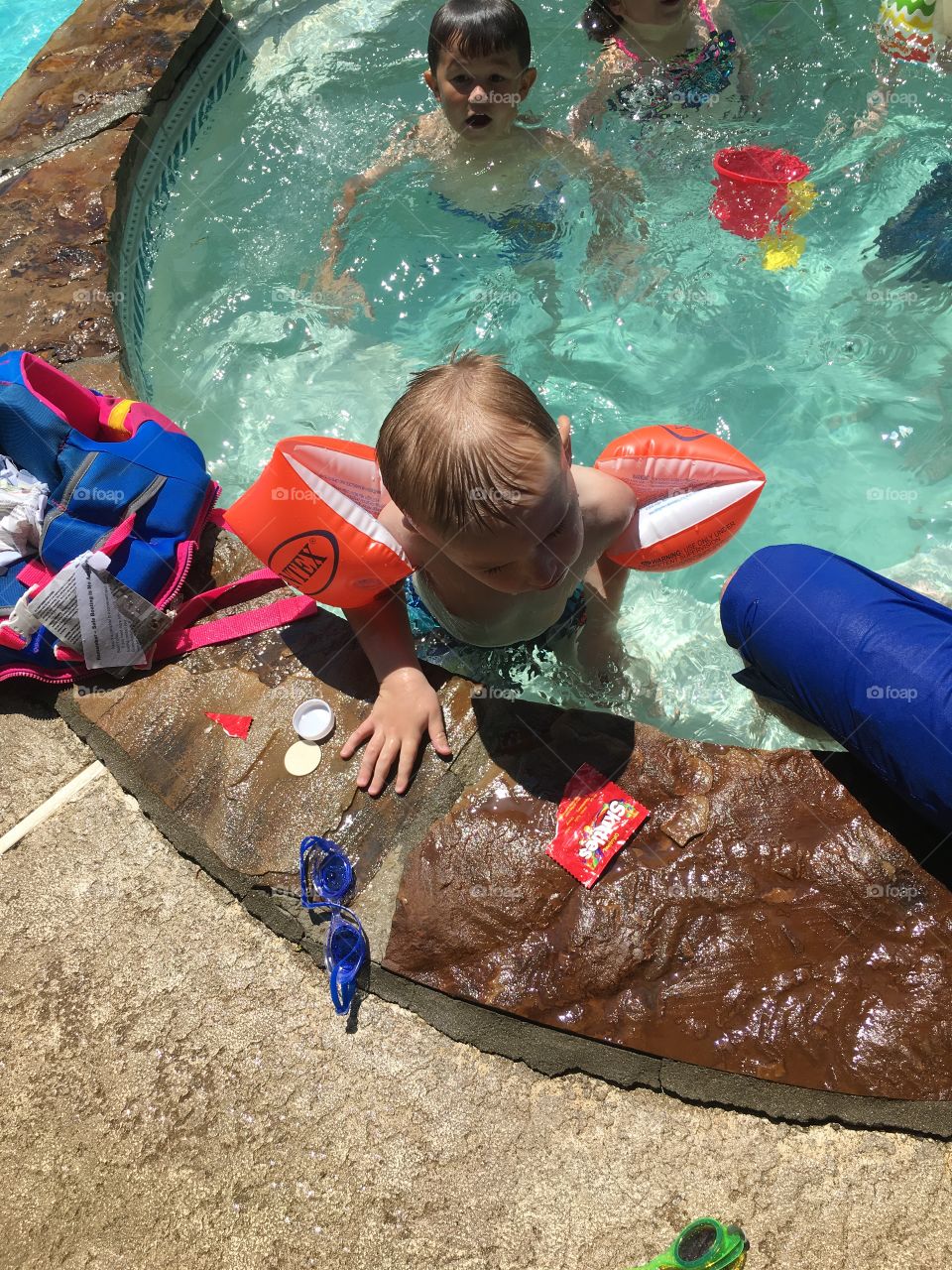 A boy and some swimmies 