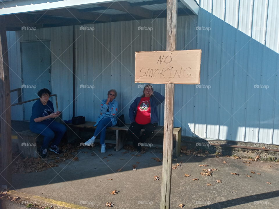 sitting here taking a break smoking a cigarette. hmmm see anything wrong with this pic?