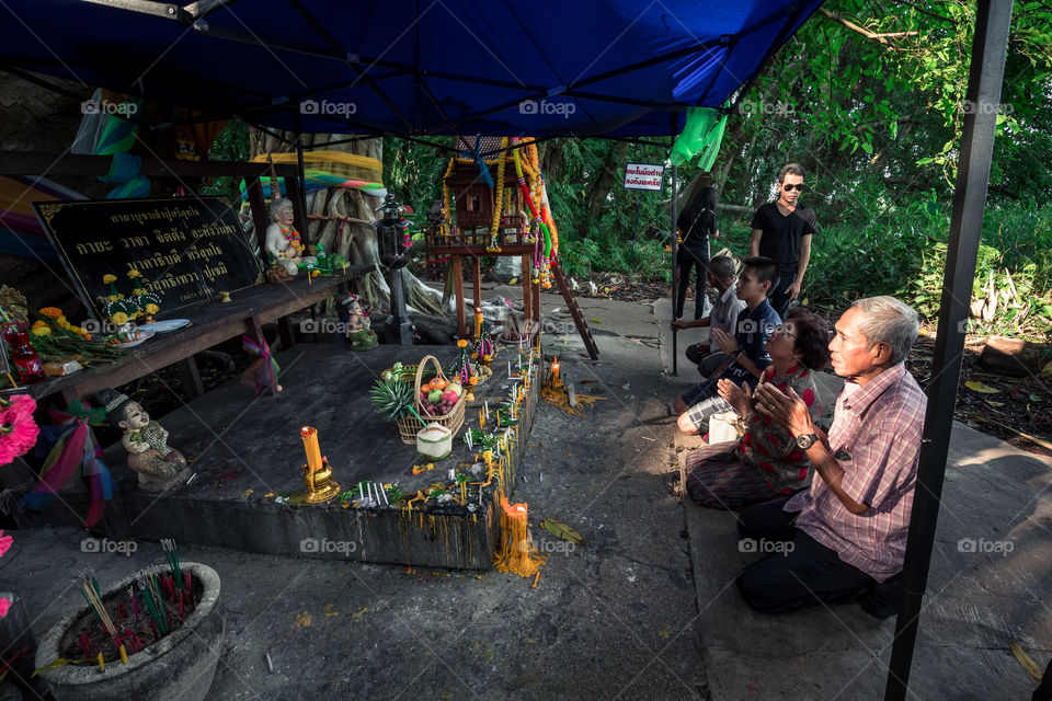 People pay respect in the temple 