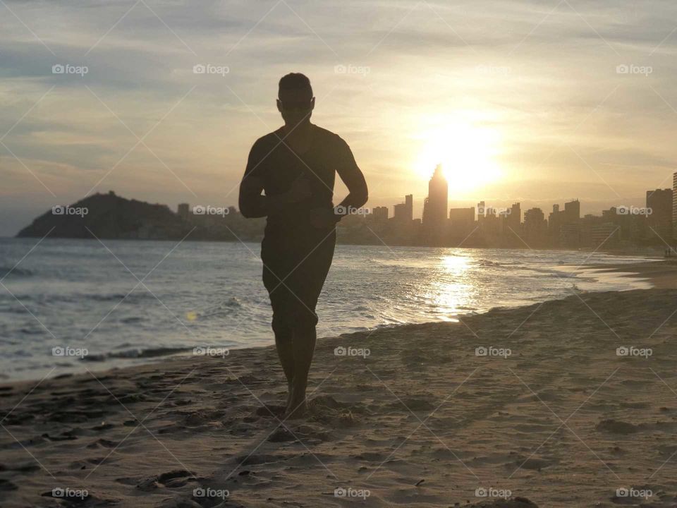 Sunrise#beach#sea#sand#human#walk#city#view