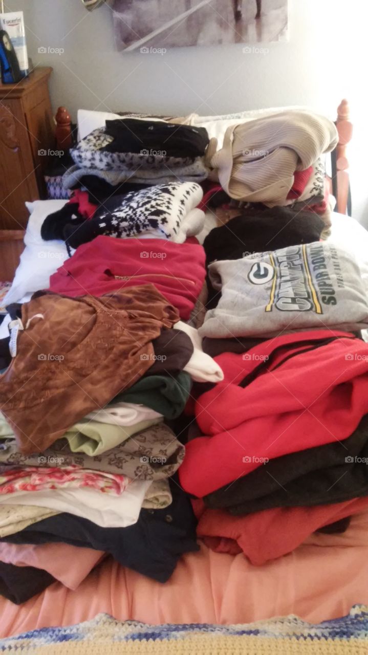Piles of Sweaters and Fleece. Piles of sweaters, fleece, and sweatshirts.