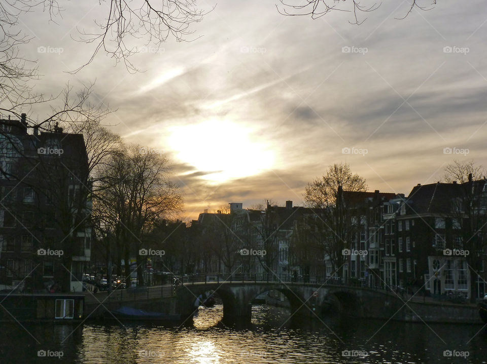 sunset bridge canals amsterdam by trvldeb07