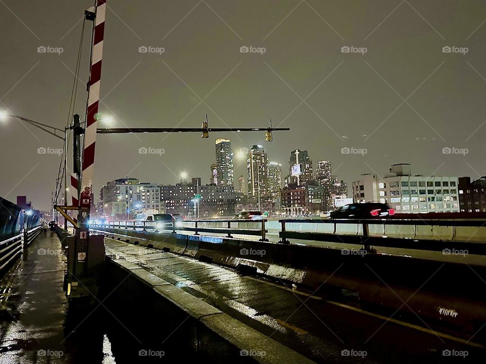 The “Pulaski Bridge” at “Newtown Creek” connects “Greenpoint”, Bklyn and LIC, Queens. It always has lots of traffic. It is especially beautiful at night when the headlights of the cars speeding by light up the entire area. 2023. Hypnotic Productions