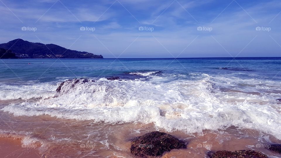 Gorgeous ocean view. The waves crashing on the shore.