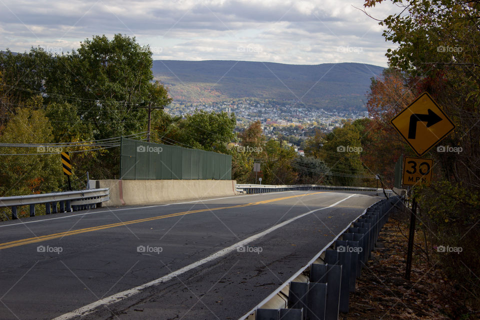 Mountain Bridge. This is a view from the mountain behind where I live looking over the woods into the city of Scranton.