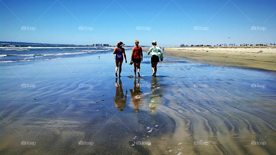 Three Women On Beach