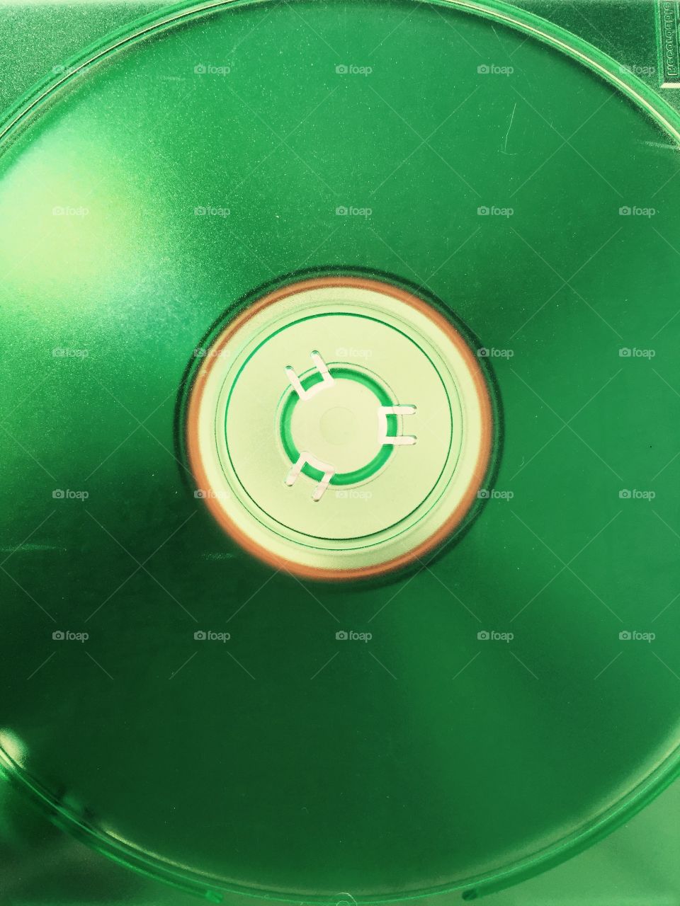 Green light . Green CD case closeup 