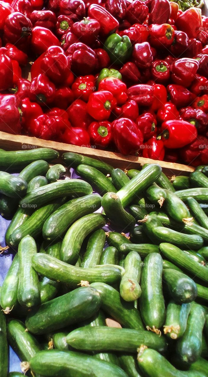 Red sweet pepper and cucumber in
market