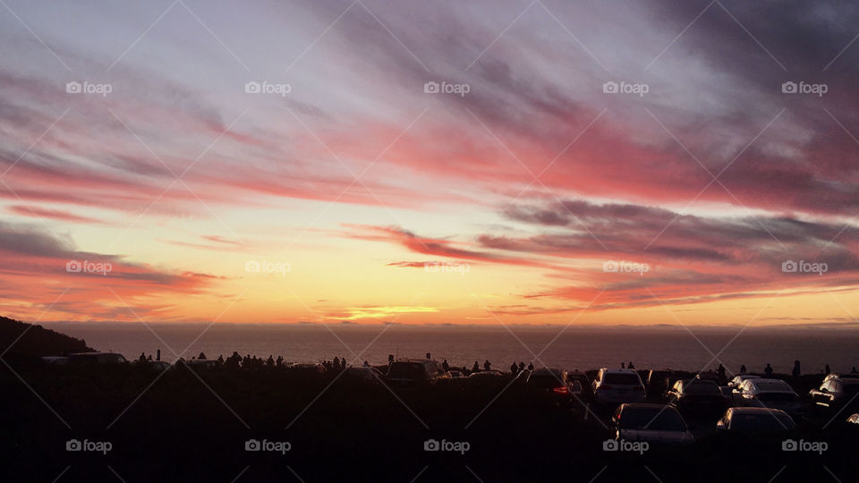 Sunset at parking lot by the sea