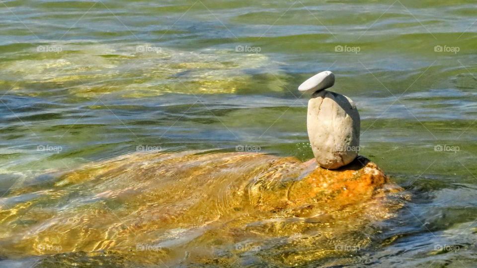 Rock pile stands up to River
