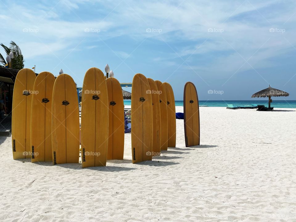 Surfing desks on the beach